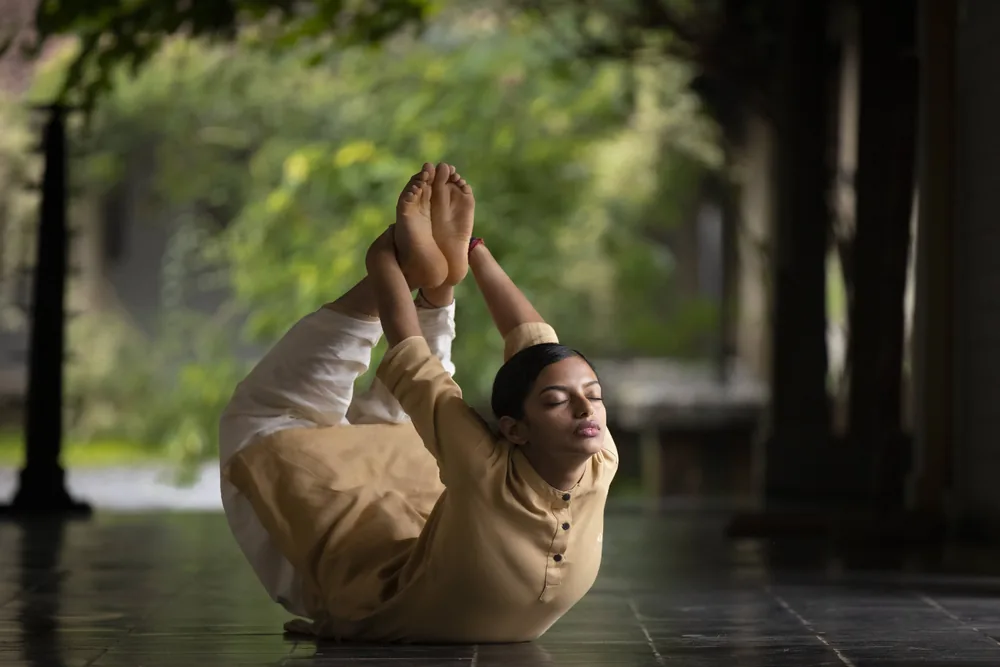 Focused Sadhana Practice in Stone Colonnade
